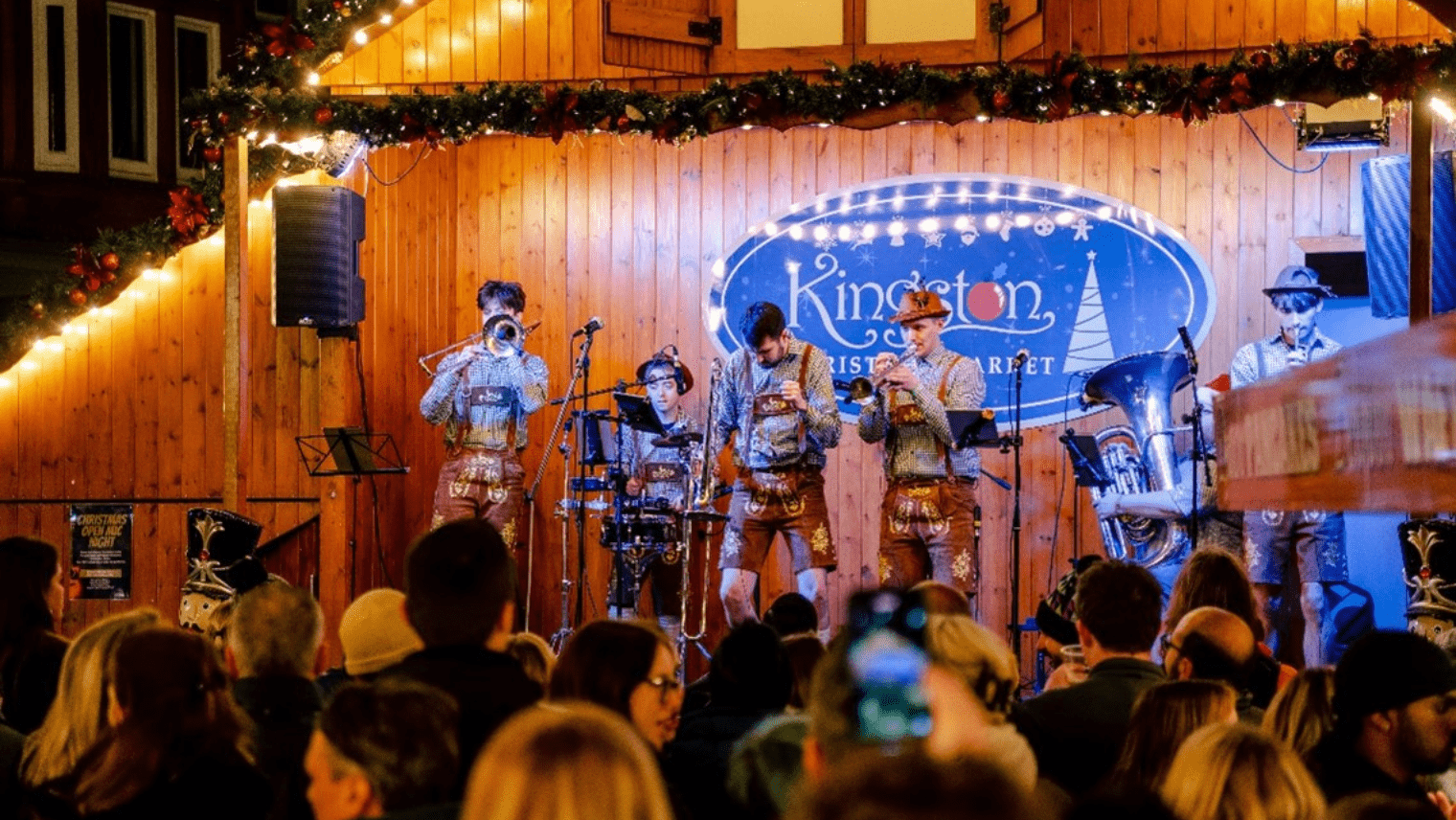 A band on stage playing instruments