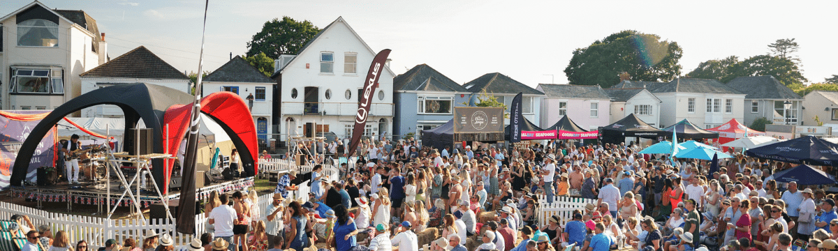 Crowd watching live music at Lymington Seafood Festival 