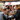 Image of a group of people sat around the table at a restaurant