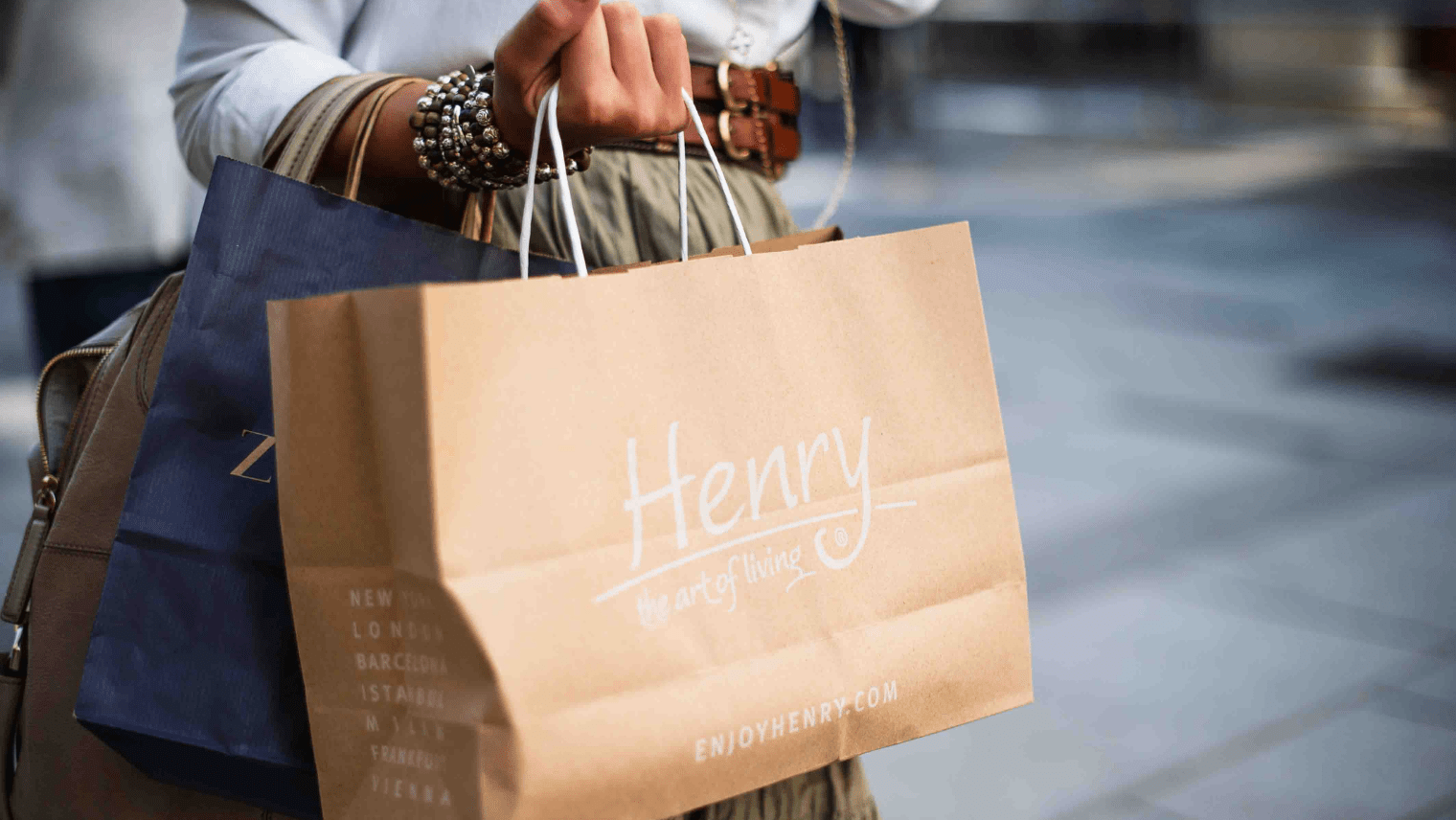A person holding shopping bags